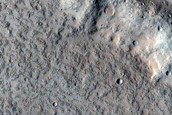 North-Pole-Facing Deposit in Crater Associated with Headwall Erosion