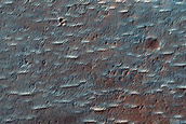 Crater with Dark Ejecta East of Huygens Crater