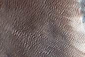North-Pole-Facing Deposit in Crater Associated with Headwall Erosion
