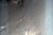 Well-Preserved 48-Kilometer Crater in Lunae Planum