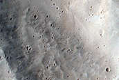North-Pole-Facing Deposit in Crater Associated with Headwall Erosion
