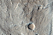 North-Pole-Facing Deposit in Crater Associated with Headwall Erosion