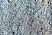 North-Pole-Facing Deposit in Crater Associated with Headwall Erosion