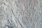 North-Pole-Facing Deposit in Crater Associated with Headwall Erosion