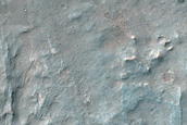 Possible Exposed Bedrock on Floor of 25-Kilometer Crater in Noachis Terra
