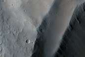 North-Pole-Facing Deposit in Crater Associated with Headwall Erosion