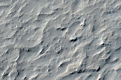 Layering in Heavily Cratered Lucus Planum Terrain