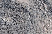 North-Pole-Facing Deposit in Crater Associated with Headwall Erosion