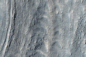 Tongue-Shaped Feature on Slope Seen in MOC Images R04-02106 and R12-01135