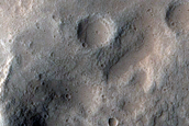 North-Pole-Facing Deposit in Crater Associated with Headwall Erosion