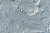 Layering in Sinuous Terrain