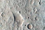 North-Pole-Facing Deposit in Crater Associated with Headwall Erosion