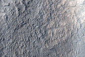 Terrain around Crater in Erebus Montes