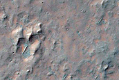 Possible Olivine-Rich Materials on Plains Southeast of Martin Crater