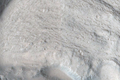 North-Pole-Facing Deposit in Crater Associated with Headwall Erosion