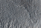 North-Pole-Facing Deposit in Crater Associated with Headwall Erosion