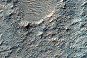 Mesa Feature within Degraded Crater
