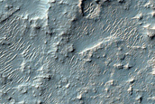 Possible Olivine-Bearing Materials in Southeast Huygens Crater
