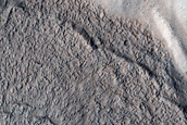 North-Pole-Facing Deposit in Crater Associated with Headwall Erosion