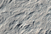 Layering in Heavily Cratered Lucus Planum Terrain