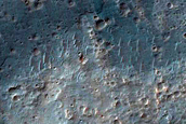 Alluvial Fan and Light-Toned Deposits in Coprates Catena Trough