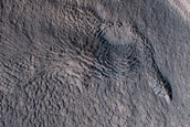 North-Pole-Facing Deposit in Crater Associated with Headwall Erosion