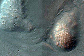 Crater in Ladon Valles Basin