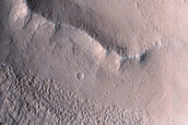 North-Pole-Facing Deposit in Crater Associated with Headwall Erosion