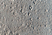North-Pole-Facing Deposit in Crater Associated with Headwall Erosion