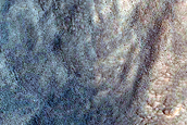 Possible Gullies in Mid-Latitude Crater near Phlegra Montes