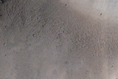 North-Pole-Facing Deposit in Crater Associated with Headwall Erosion