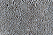 North-Pole-Facing Deposit in Crater Associated with Headwall Erosion