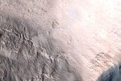 North-Pole-Facing Deposit in Crater Associated with Headwall Erosion