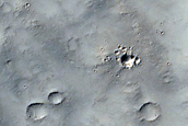 Impact Crater Ejecta in Memnonia Fossae