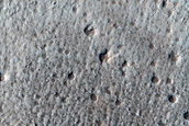 North-Pole-Facing Deposit in Crater Associated with Headwall Erosion