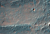 Olivine-Rich Material around Ridge in Thaumasia Planum