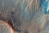 Layering in Crater Walls and Gullies with Bright Deposits