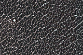 Ice-Filled North Polar Layered Deposits Crater