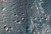 Alluvial Fan and Light-Toned Deposits in Coprates Catena Trough