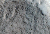 North-Pole-Facing Deposit in Crater Associated with Headwall Erosion