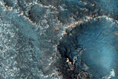 Light-Toned Outcrops on Crater Floor near Eden Patera