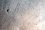 North-Pole-Facing Deposit in Crater Associated with Headwall Erosion