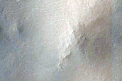 Candidate Recent Impact Site in Maggini Crater