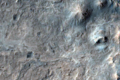 Exposed Light-Toned Material on Crater Rim near Mawrth Vallis