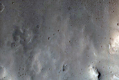 North-Pole-Facing Deposit in Crater Associated with Headwall Erosion