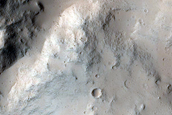 North-Pole-Facing Deposit in Crater Associated with Headwall Erosion
