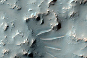Ejecta Flows from Well-Preserved 30 Km Crater