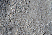 Layered Feature in Crater in Nilosyrtis Mensae