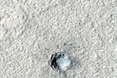Possible Vent on Volcanic Terrain near Lineated Valley Floor Material
