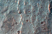 Alluvial Fan and Light-Toned Deposits in Coprates Catena Trough
